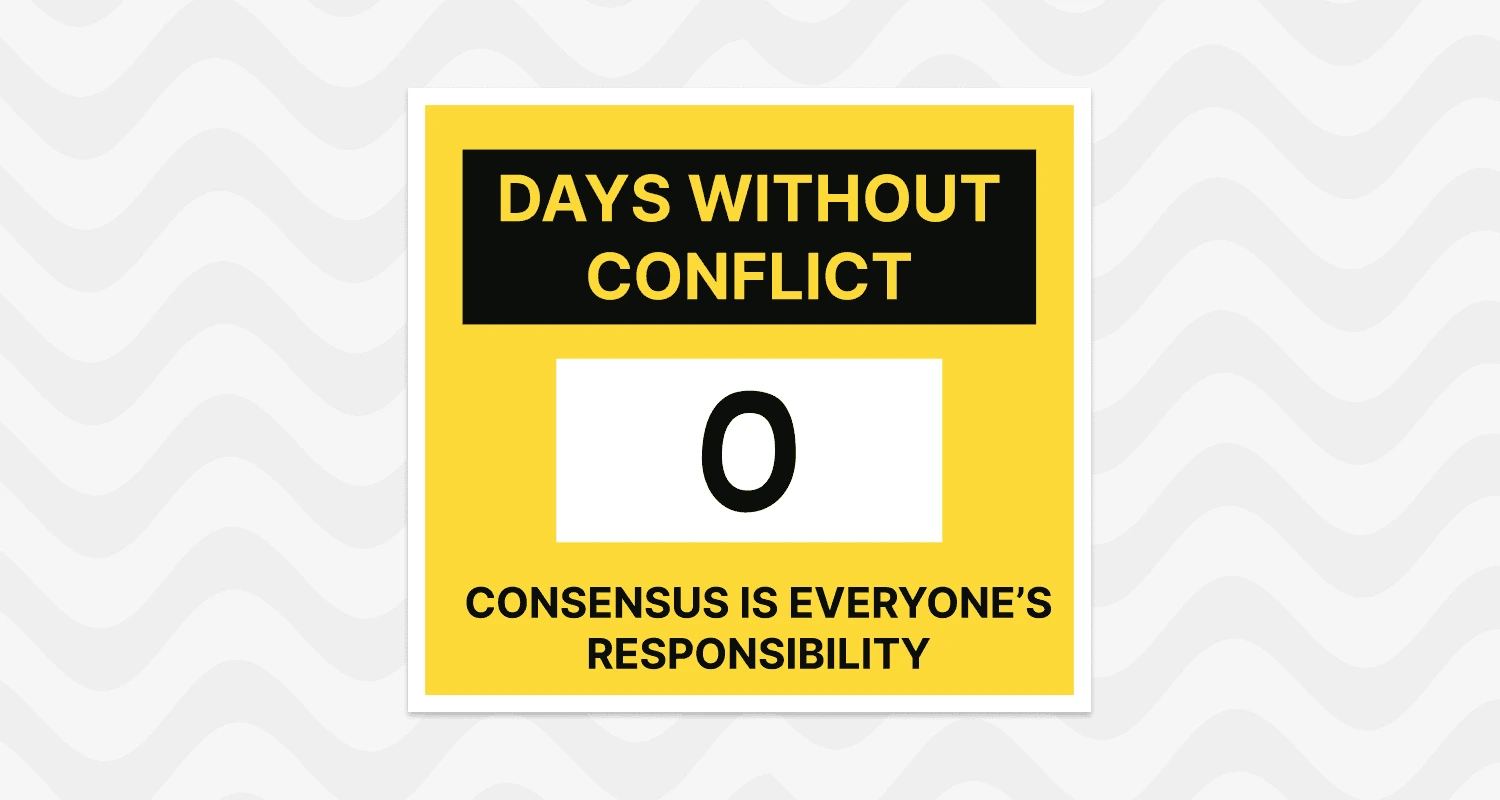 A workplace-safety-style sign reading &lsquo;Days without conflict: 0 &mdash; consensus is everyone&rsquo;s responsibility.&rsquo;